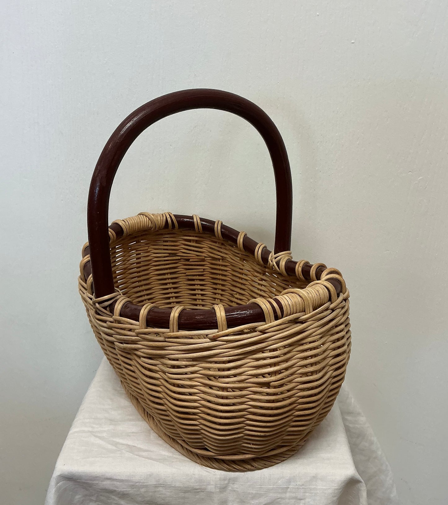 VINTAGE RATTAN BASKET WITH BAMBOO HANDLE
