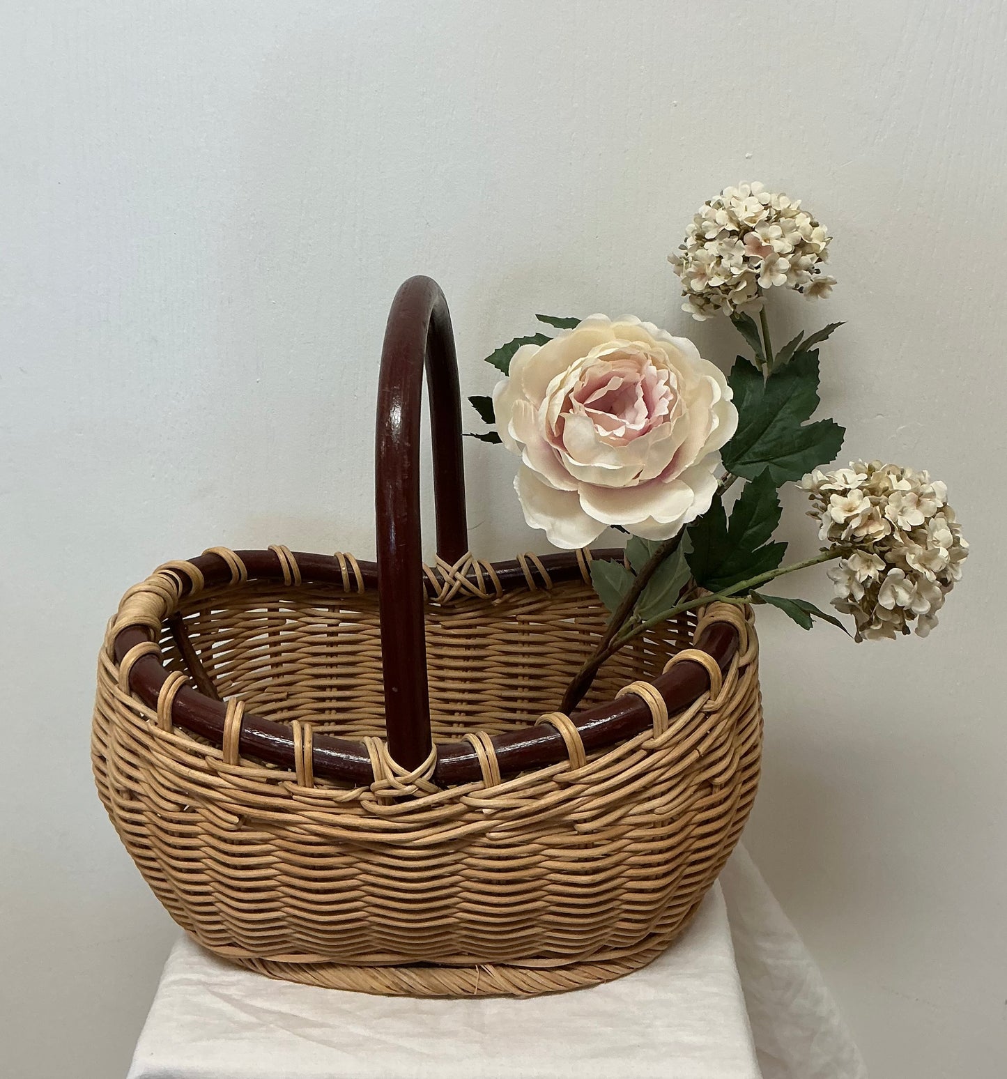 VINTAGE RATTAN BASKET WITH BAMBOO HANDLE